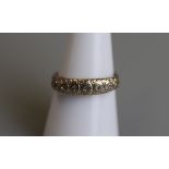Gold diamond set eternity ring - Size N