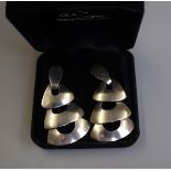 Pair of silver drop earrings