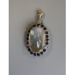 Gold moonstone & sapphire set pendant (not marked but guaranteed 9ct possibly 18ct)
