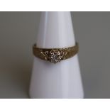 Gold diamond solitaire ring - Size O