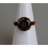 Gold topaz & garnet set ring - Size K