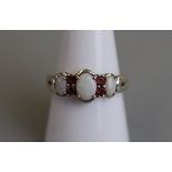 Opal and ruby silver ring