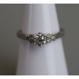18ct white gold diamond solitaire ring with diamond set shoulders - Size R