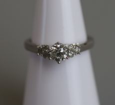 18ct white gold diamond solitaire ring with diamond set shoulders - Size R