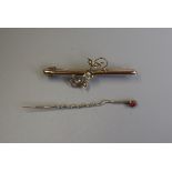 Gold pearl set bar brooch together with gold stick pin