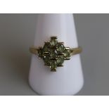 Gold peridot set ring - Size T