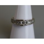 Fine 18ct gold diamond ring set with 9 princess cut diamonds - Size Q