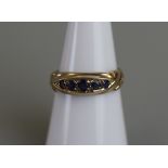 Gold 5 stone sapphire set ring - Size M