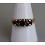 Gold garnet set ring - Size P½