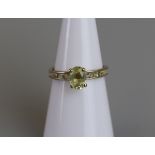 Gold peridot set ring - Size K½