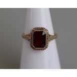 Gold garnet set ring - Size J