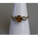 Gold citrine & diamond set ring - Size O