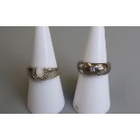 2 silver stone set rings