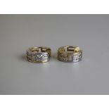 Pair of 18ct gold channel set diamond earrings