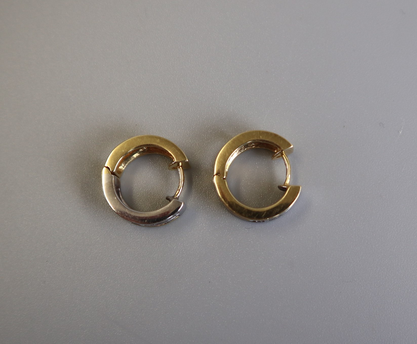 Pair of 18ct gold channel set diamond earrings - Image 2 of 2