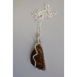 Silver & amber pendant on chain