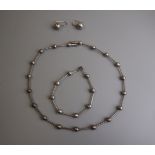 Andrew Scott designer necklace bracelet and earrings