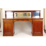 An early 19th century mahogany mirror back sideboard,