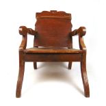 A 19th century scumbled open armchair on sabre legs, h. 84 cm, w. 63 cm, d.