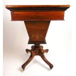 An Edwardian walnut, boxwood strung and marquetry games/work table,