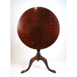 An 18th century and later mahogany tilt top tripod table,