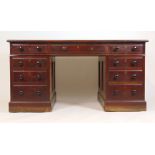 An early 20th century mahogany desk,