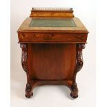 A late Victorian burr walnut davenport,