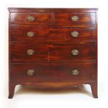 An early 19th century mahogany chest of two short over three long drawers on splay feet, h.