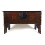 A late 17th century oak miniature six plank coffer with initials M & O carved to front, h. 33 cm, w.