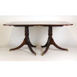 A Regency style mahogany dinning table,