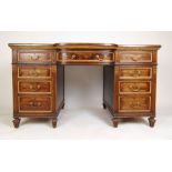 An early 20th century mahogany and parcel gilt desk,