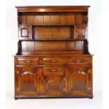 A reproduction 18th century style oak dresser,