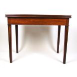 An 18th century mahogany tea table,