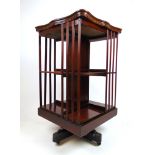 An Edwardian mahogany, satinwood banded and marquetry revolving bookcase,