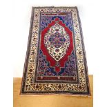 A handwoven Persian rug,