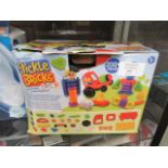 A boxed collection of Stickle Bricks