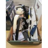 A box containing a laminator, windscreen wipers, desktop lights,