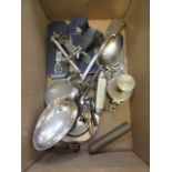 A box containing an assortment of collectibles to include basting spoon, knife, collector's spoons,