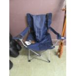 An adult folding arm chair