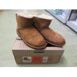 A pair of Kirkland kid's size 5 suede boots