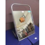 A modern chrome tubular easel mirror