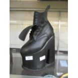 A correctional boot with leather upper (size unknown)