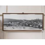 A framed and glazed photograph of a Cornish harbour scene