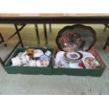 Two trays containing collector's plates, a coffee pot,