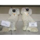 A pair of Staffordshire hearth dogs