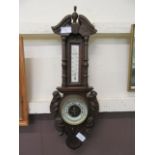 A small carved oak banjo barometer