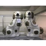 A pair of Staffordshire hearth dogs