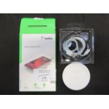 A boxed Belkin wireless charging pad