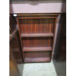 A set of mahogany wall shelves,