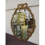 An ornate framed wall mirror